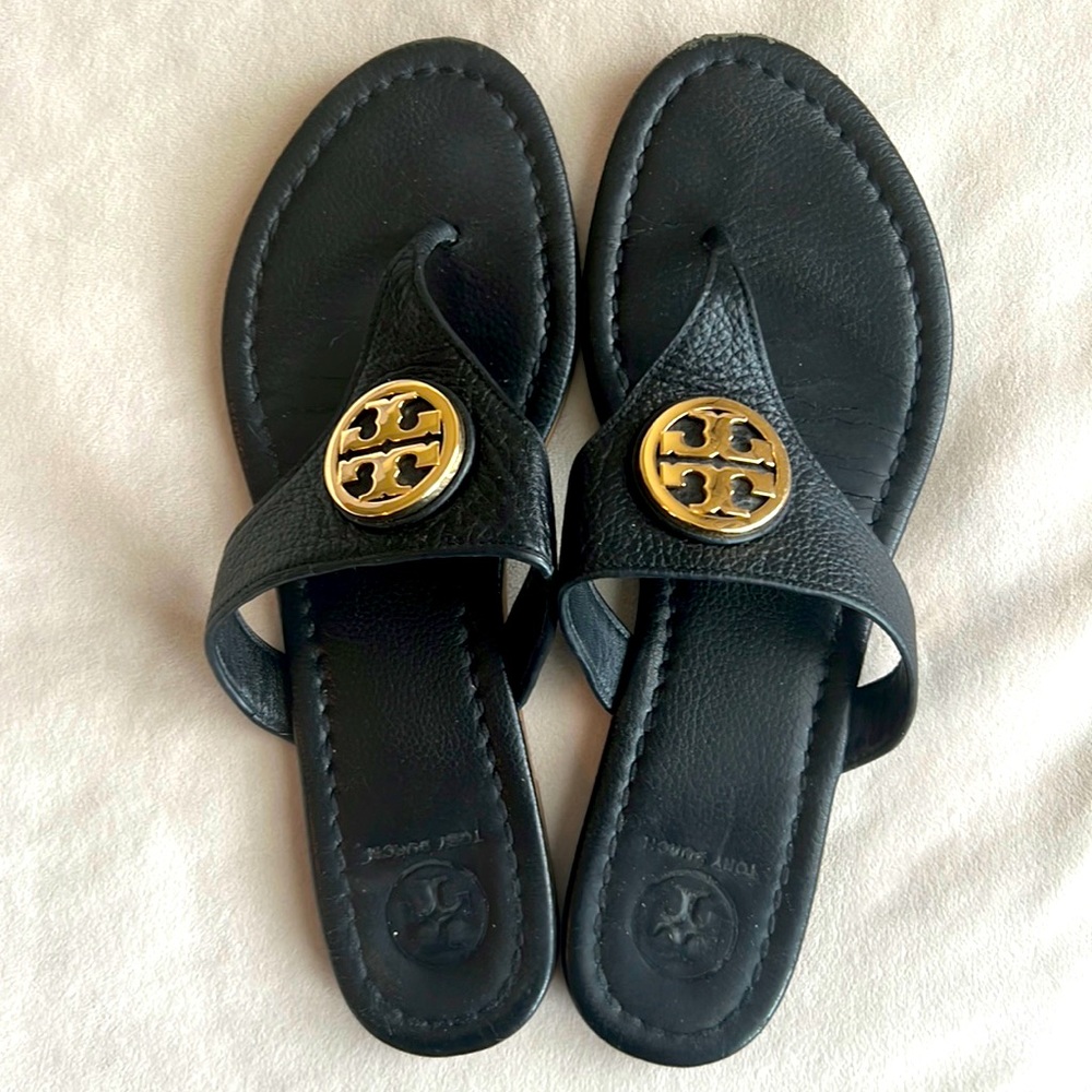 Black Tory Burch sandals with gold Tory Burch logo